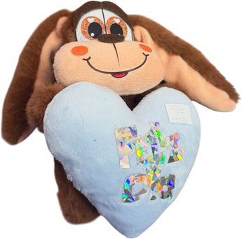 Peluche de perrito con corazón azul, regalo suave y adorable, ideal para regalar en Miami, de la marca Florist in Doral.