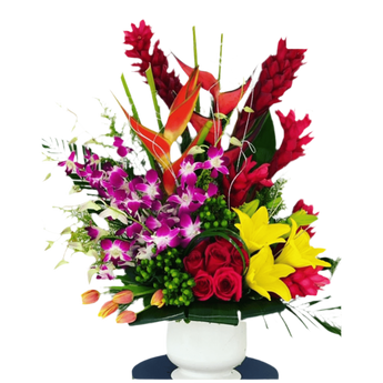 Arreglo tropical de flores de Doral Roses Miami con flores coloridas y exóticas en un hermoso diseño natural.
