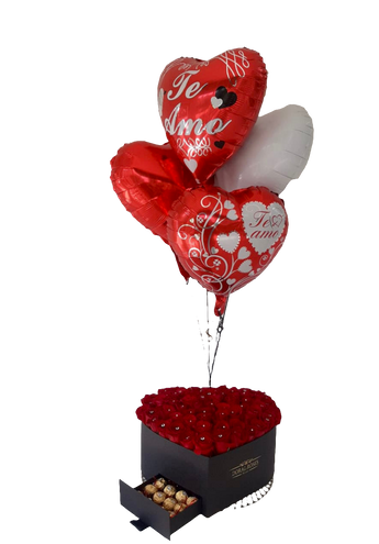 Ramo de flores Sensational de Doral Roses Miami con corazones brillantes y chocolates, decoración floral elegante.