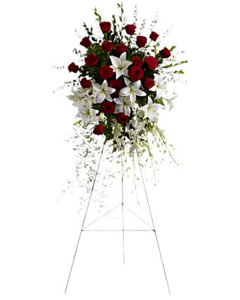 Arreglo funerario de flores con lirios y rosas de Doral Roses Miami, para condolencias y empatía, entrega hoy.