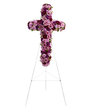 Cruz funeraria con flores de Doral Roses Miami, símbolo de amor y respeto, ideal para condolencias y ofrendas funerarias.