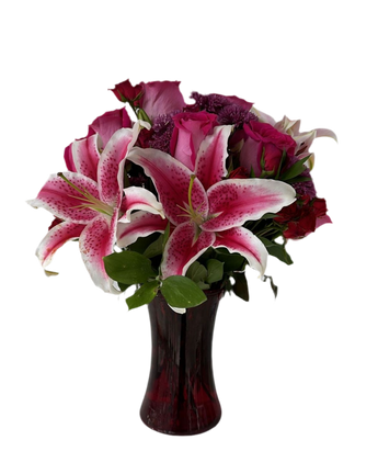 Ramo de flores Honored de Doral Roses Miami con flores frescas y coloridas, ideal para homenajes y ocasiones especiales.