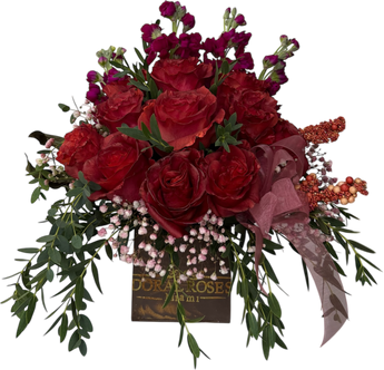 Arreglo floral de lujo de Doral Roses Miami para temporada de Acción de Gracias, con flores elegantes y decorativas en tonos cálidos