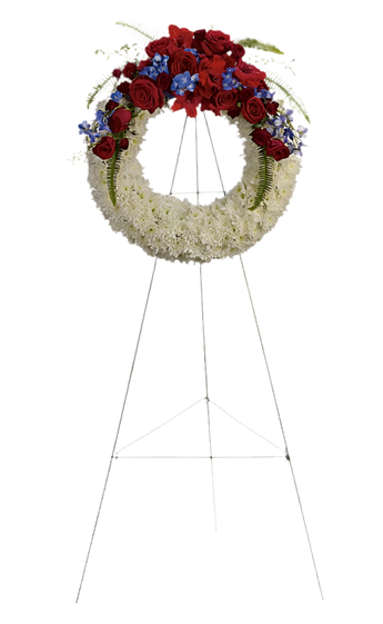 Corona funeraria con flores blancas y verdes de Doral Roses Miami para condolencias y tristeza compartida.