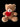Osito de abrazos eternos de Doral Roses Miami, regalo de peluche en tonos bronce, ideal para fechas especiales.
